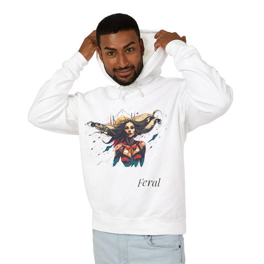 Young man with short hair pulling up the hood of a white hoodie featuring vibrant artistic print of a fierce woman with long flowing hair, red-orange armored top, colorful paint splash design, "Feral" text below