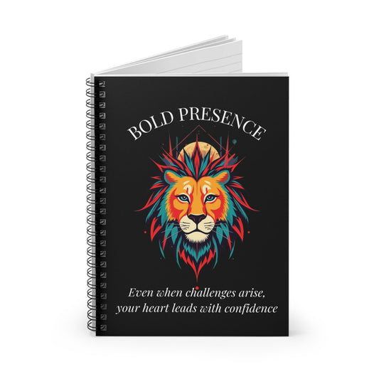 Notebook with a colorful abstract lion head portrait, intense expression, flowing mane, and paint splatters on a black background, featuring the words "BOLD PRESENCE" and inspirational quote "Even when challenges arise, your heart leads with confidence".