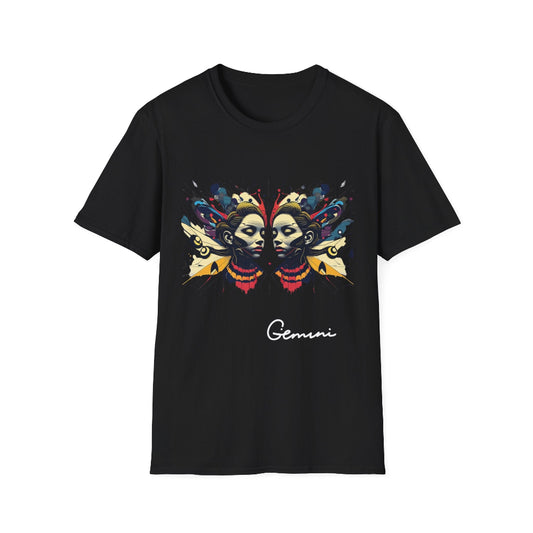 Black unisex cotton t-shirt featuring bold Gemini zodiac graphic: vibrant abstract twin female faces with flowing hair, intense expressions, geometric patterns, and dynamic multicolored paint splatters in gold, red, navy, teal, and black tones exploding outward to form butterfly wings. Elegant white cursive "Gemini" text below. Astrology zodiac motivational crewneck tee.