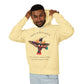 Man modeling a pale yellow hoodie with 'Move With Grace' inspirational hummingbird graphic and quote 'Even when the world accelerates, Your center remains steady' printed on the front.