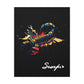 Close up of black canvas wall art print of colorful abstract Scorpio scorpion with raised stinger, intense eyes, intricate tail and pincers, geometric patterns, and cosmic splatters on dark background, featuring "Scorpio" in elegant white cursive.