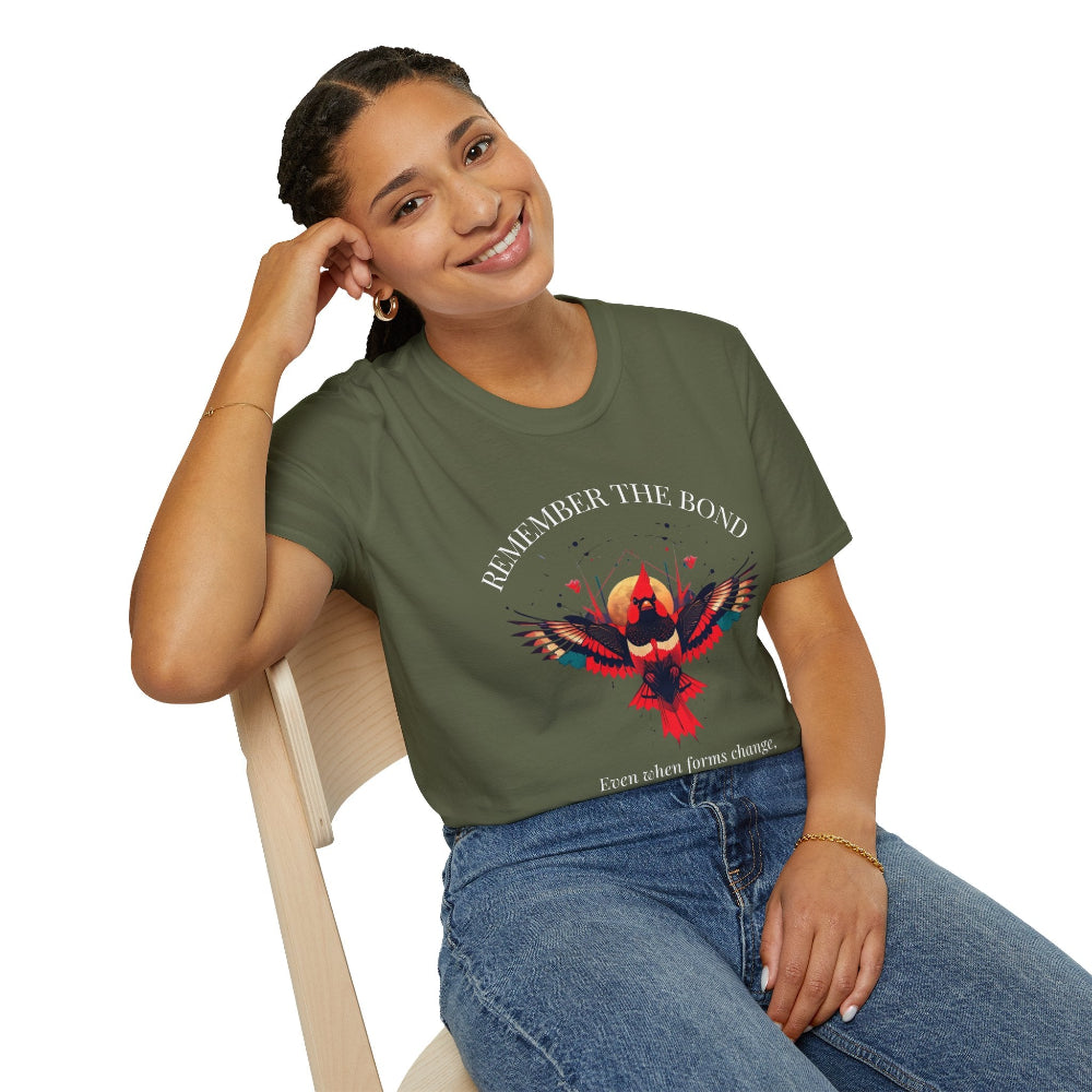 Woman modeling an olive green t-shirt with 'Remember The Bond' inspirational bird graphic and quote 'Even when forms change, The love remains alive' printed on the front.