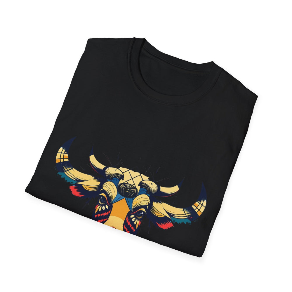 Black folded unisex cotton t-shirt featuring bold Year of the Ox graphic print: vibrant abstract ox/bull face portrait with large curved horns, intense eyes, geometric patterns, and dynamic multicolored paint splatters in gold, red, blue, teal, and black tones exploding outward. Chinese text "牛年" (Year of the Ox) printed below in white. Zodiac Chinese New Year motivational crewneck tee.