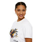 White unisex cotton t-shirt in side profile on smiling woman with braided hair, featuring bold Virgo zodiac graphic on chest: vibrant abstract woman holding wheat sheaf, serene expression, flowing hair with headscarf, detailed feathers, geometric accents, and dynamic multicolored paint splatters in gold, red, navy, teal, and black tones bursting outward. Elegant black cursive "Virgo" text below. Astrology zodiac motivational crewneck tee.