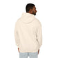 Back view of a man wearing cream hoodie, plain solid fabric with no print or design, hood up