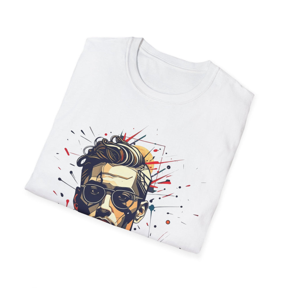 White folded unisex cotton t-shirt featuring bold Primal graphic: stylized cool man portrait with sunglasses, stylish hair, intense expression, vibrant red, yellow, teal paint splatters bursting outward. Primal masculine energy motivational crewneck tee.