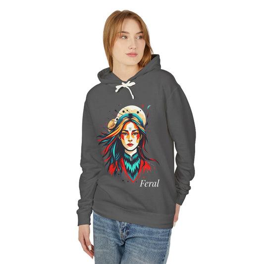 Young woman modeling Dark gray hoodie with vibrant artistic portrait of a fierce woman with long multicolored flowing hair, teal and red face paint, colorful splash design, third-eye motif, "Feral" text below