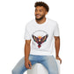 White unisex cotton t-shirt modeled by smiling man with curly hair and beard, featuring bold "Trust Your Vision" graphic: vibrant abstract phoenix/eagle with spread wings, intense expression, colorful geometric accents, and dynamic paint splatters in red, orange, teal, blue, and gold tones around an orange moon. Arched white text "TRUST YOUR VISION" above and smaller quote "Even when others can't see where you're going, see with your own eyes" below. Motivational spiritual empowerment crewneck tee.