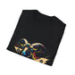 Black folded unisex cotton t-shirt featuring bold Year of the Goat graphic print: vibrant abstract goat head portrait with large curved horns, intense expression, geometric patterns, and dynamic multicolored paint splatters in gold, red, black, blue, teal, and orange tones exploding outward. Chinese text "羊年" (Year of the Goat) printed below in white. Zodiac Chinese New Year motivational crewneck tee.