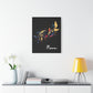 Black canvas wall art print of colorful abstract mirrored fish with flowing fins and cosmic splatters on dark background, featuring "Pisces" in elegant white cursive displayed in a modern home décor setting above a console table with books and yellow lamp.