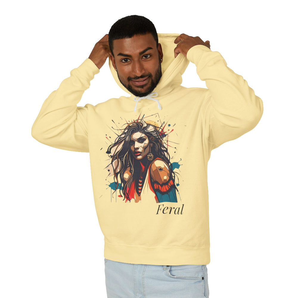 Man wearing a beige hoodie with a graphic design of a woman's face and the word 'Feral'.