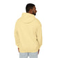 Back view of a man wearing yellow hoodie, plain solid fabric with no print or design, hood up