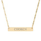 Gold bar necklace featuring engraved uppercase text "CHOSEN" on a sleek matte gold pendant, suspended on a delicate matching gold chain. Minimalist motivational affirmation jewelry for empowerment and self-worth.