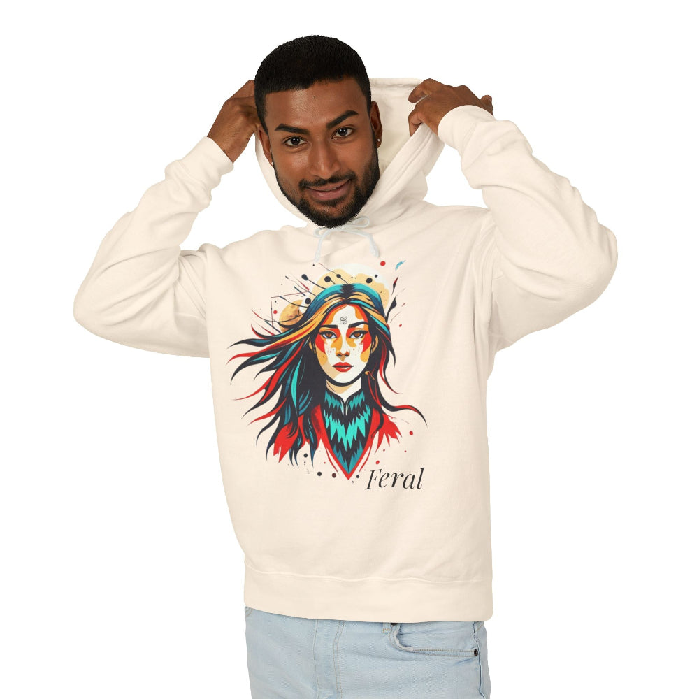 Young man with short hair pulling up the hood of a white hoodie featuring vibrant artistic print of a fierce woman with long flowing hair, red-orange armored top, colorful paint splash design, "Feral" text below