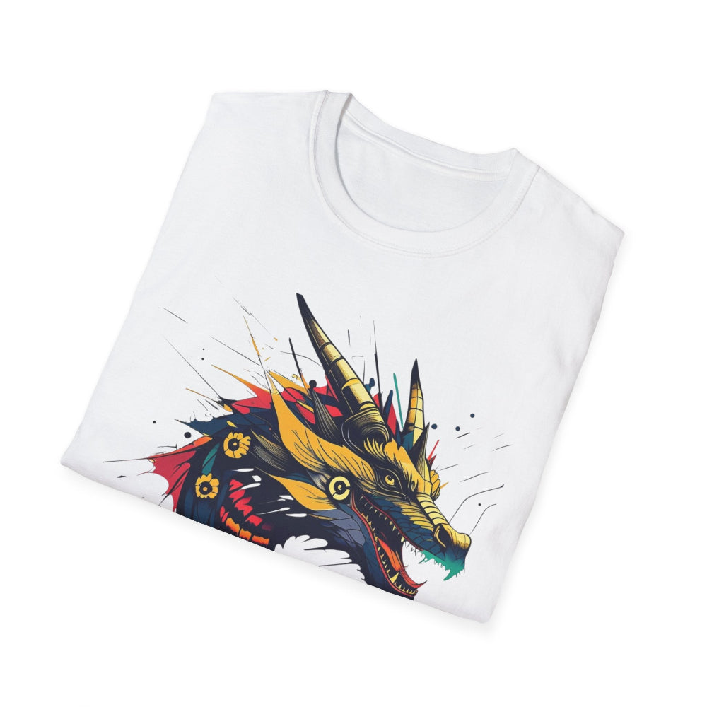 White folded unisex cotton t-shirt featuring bold Year of the Dragon graphic print: vibrant abstract dragon head portrait with fierce open mouth, sharp golden horns, intricate scales, flowing mane, and dynamic multicolored paint splatters in gold, red, black, blue, teal, and orange tones exploding outward. Chinese text "龙年" (Year of the Dragon) printed below in black. Zodiac Chinese New Year motivational crewneck tee.