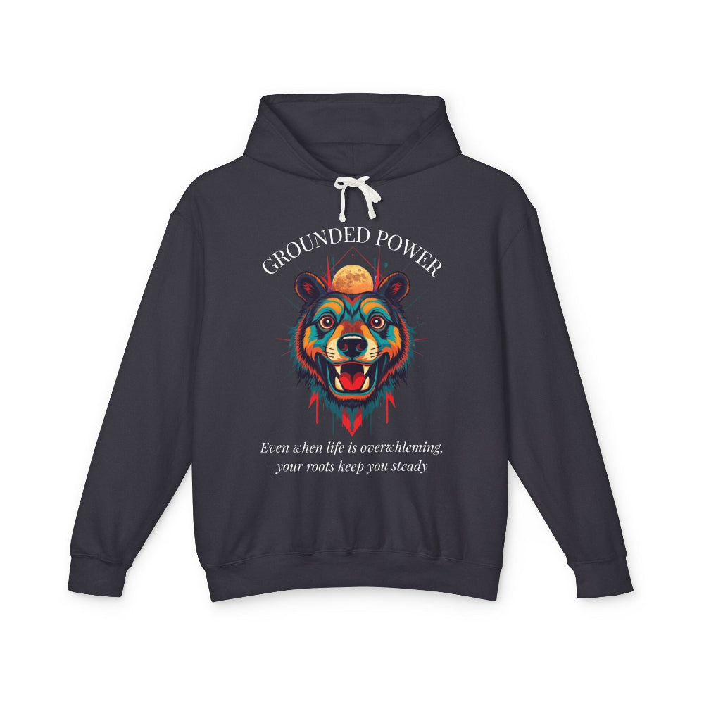 Dark gray hoodie with vibrant multicolored bear head graphic, roaring expression, fur in blue orange teal splashes, full moon above, "GROUNDED POWER" arched text, motivational quote "Even when life is overwhelming, your roots keep you steady" below