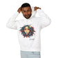 Young man with short hair pulling up the hood of a white hoodie featuring vibrant artistic portrait of a fierce woman with curly multicolored flowing hair, teal red blue orange face accents, large hoop earrings, third-eye symbol, "Feral" text below