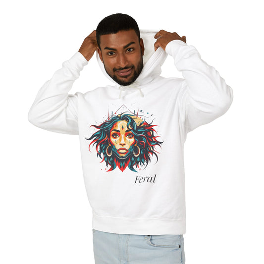 Young man with short hair pulling up the hood of a white hoodie featuring vibrant artistic portrait of a fierce woman with curly multicolored flowing hair, teal red blue orange face accents, large hoop earrings, third-eye symbol, "Feral" text below