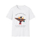 White t-shirt featuring a vibrant hummingbird graphic with the text "MOVE WITH GRACE" arched above and the quote "Even when the world accelerates, Your center remains steady" below. Motivational spiritual apparel.