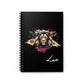 Notebook with a colorful lion design and 'Leo' text on a black background