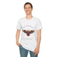 White unisex cotton t-shirt modeled by smiling man with short brown hair, featuring bold "Trust the Silence" graphic: vibrant abstract owl with detailed feathers, intense expression, colorful geometric accents, and dynamic paint splatters in red, orange, teal, blue, and gold tones around an orange moon. Arched white text "TRUST THE SILENCE" above and smaller quote "Even when the world is quiet, wisdom speaks softly" below. Motivational spiritual empowerment crewneck tee.