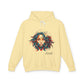 Yellow hoodie with a colorful graphic of a woman's face and the word 'Feral' on a white background