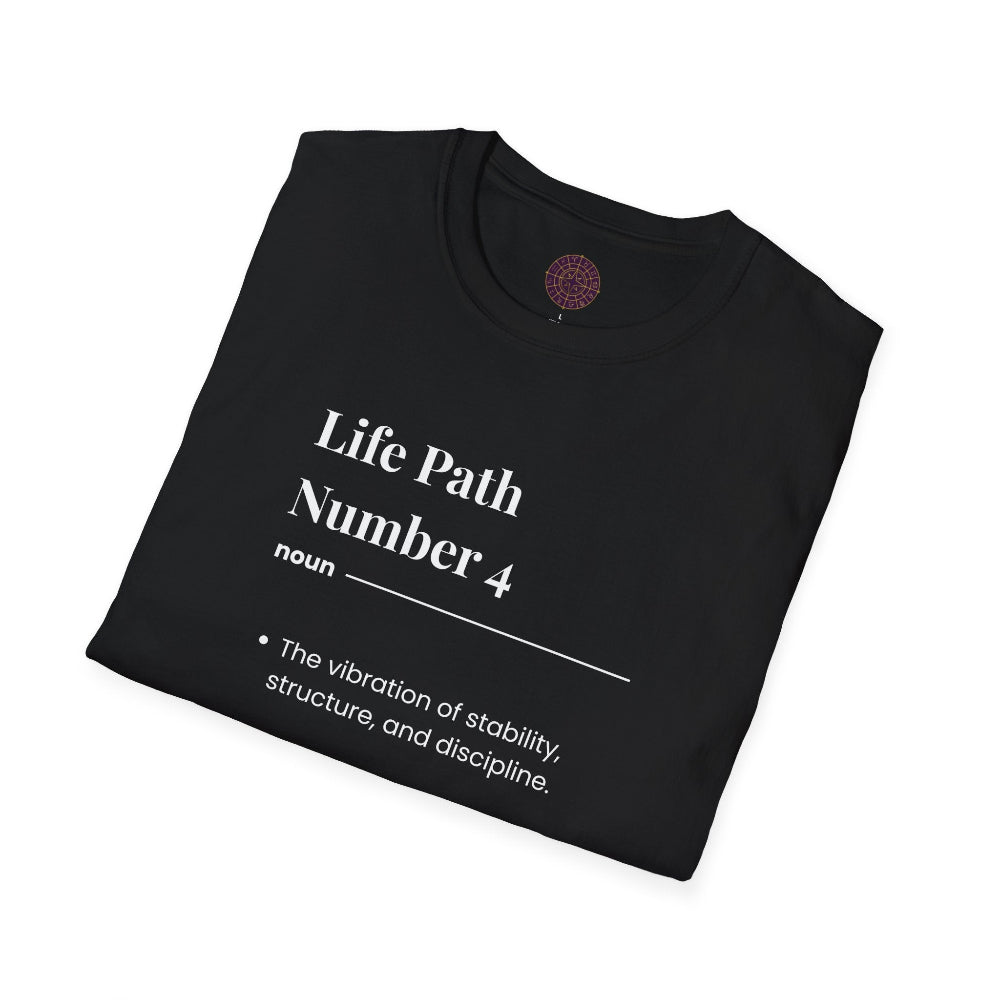 Black folded unisex cotton t-shirt featuring bold Life Path Number 4 numerology print: dictionary-style definition text reading "Life Path Number 4 noun · The vibration of stability, structure, and discipline." Motivational spiritual numerology crewneck tee flat lay with visible purple/gold zodiac wheel inner tag.