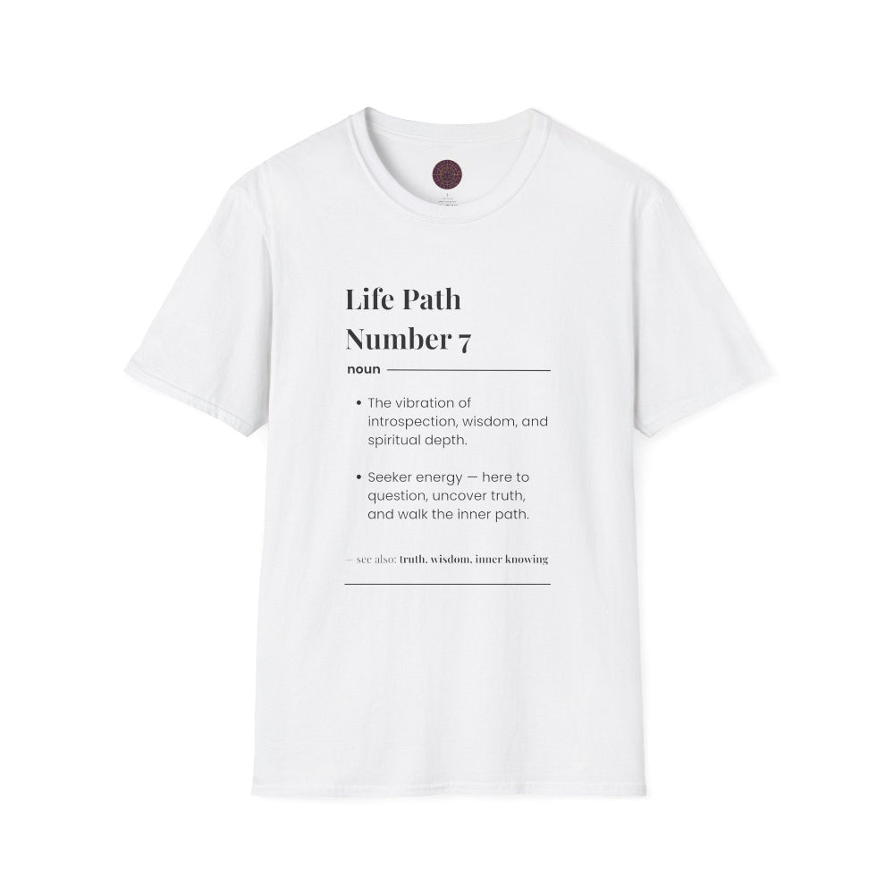 White unisex cotton t-shirt featuring bold Life Path Number 7 numerology print: dictionary-style definition of introspection, wisdom, spiritual depth, seeker energy, here to question, uncover truth and walk the inner path. Motivational spiritual numerology crewneck tee flat lay with visible purple/gold zodiac wheel inner tag.