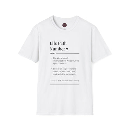 White unisex cotton t-shirt featuring bold Life Path Number 7 numerology print: dictionary-style definition of introspection, wisdom, spiritual depth, seeker energy, here to question, uncover truth and walk the inner path. Motivational spiritual numerology crewneck tee flat lay with visible purple/gold zodiac wheel inner tag.