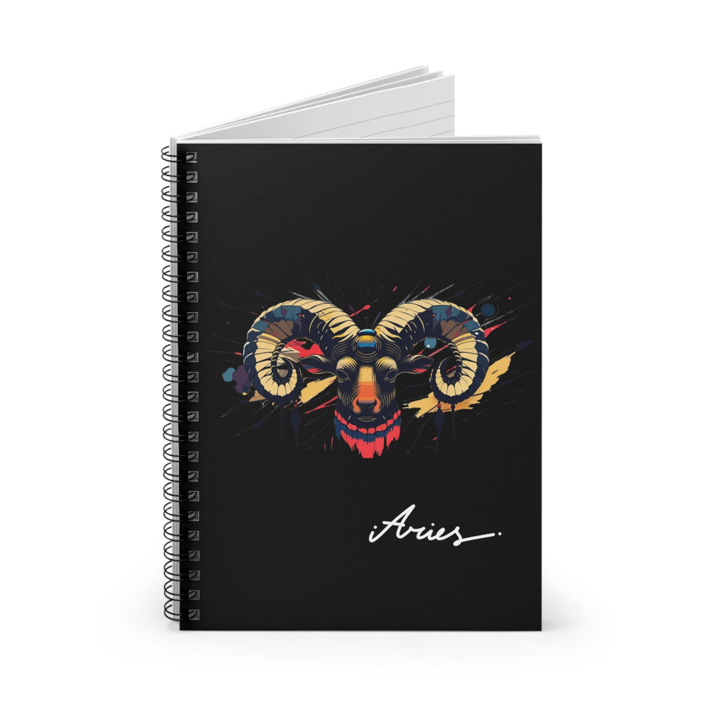 Notebook with a colorful abstract Aries ram head portrait, large curved horns, intense expression, and paint splatters on a black background, featuring the word "Aries".