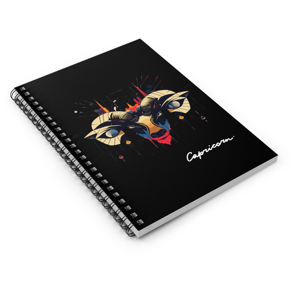 Notebook with Capricorn zodiac design on a black background