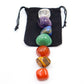 Set of 7 polished tumbled healing crystals in black velvet drawstring pouch: tiger's eye, carnelian, green aventurine, amethyst, clear quartz, red jasper, lapis lazuli – natural gemstones for chakra balancing, meditation, and energy healing