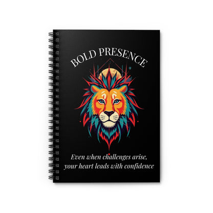 Close up of notebook with a colorful abstract lion head portrait, intense expression, flowing mane, and paint splatters on a black background, featuring the words "BOLD PRESENCE" and inspirational quote "Even when challenges arise, your heart leads with confidence".