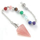 Silver pendulum with a large polished rose quartz triangular point, attached to a chain with seven chakra gemstone beads (red jasper, rose quartz, tiger's eye, green aventurine, aquamarine, lapis lazuli, amethyst) and an ornate silver acorn charm. Chakra dowsing tool for divination and energy healing.