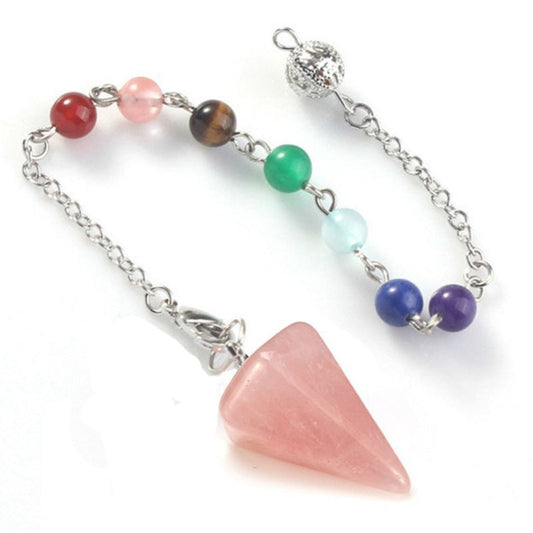 Silver pendulum with a large polished rose quartz triangular point, attached to a chain with seven chakra gemstone beads (red jasper, rose quartz, tiger's eye, green aventurine, aquamarine, lapis lazuli, amethyst) and an ornate silver acorn charm. Chakra dowsing tool for divination and energy healing.