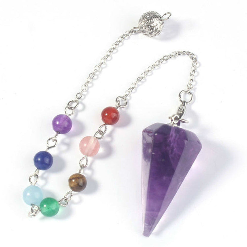 Silver pendulum with a large polished purple amethyst triangular point, attached to a chain with seven chakra gemstone beads (green aventurine, aquamarine, lapis lazuli, amethyst, rose quartz, carnelian, tiger's eye) and an ornate silver acorn charm. Chakra dowsing tool for divination and energy healing.