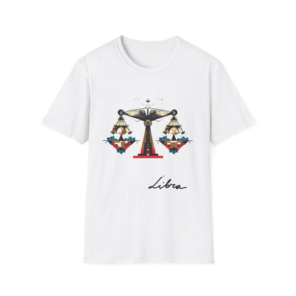 White unisex cotton t-shirt featuring bold Libra zodiac graphic: vibrant abstract scales of justice with balanced arms, intricate geometric and triangular motifs, central axis design, symmetrical layout, and dynamic multicolored paint splatters in gold, red, navy, teal, and black tones bursting outward. Elegant black cursive "Libra" text below. Astrology zodiac motivational crewneck tee.
