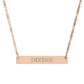 Rose gold bar necklace with engraved uppercase text "DIVINE" on a sleek matte pendant, suspended on a delicate matching rose gold chain. Minimalist spiritual affirmation jewelry for empowerment and divine connection.