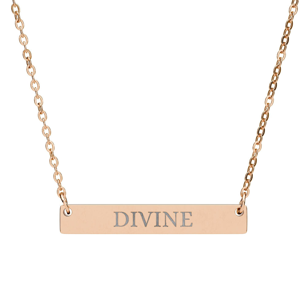 Rose gold bar necklace with engraved uppercase text "DIVINE" on a sleek matte pendant, suspended on a delicate matching rose gold chain. Minimalist spiritual affirmation jewelry for empowerment and divine connection.