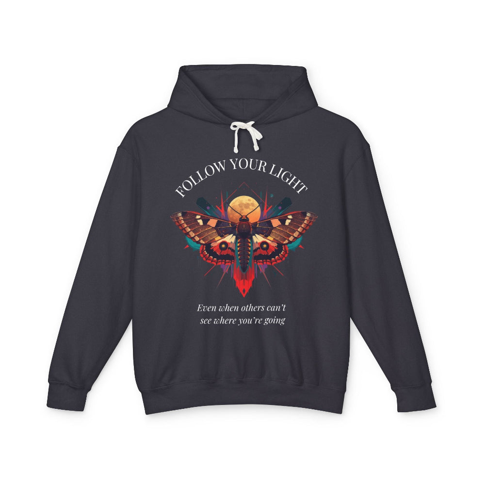 Dark gray hoodie with vibrant multicolored moth/butterfly graphic, geometric sun/moon elements, "FOLLOW YOUR LIGHT" arched text above, motivational quote "Even when others can't see where you're going" below