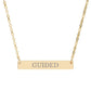Gold bar necklace with engraved uppercase text "GUIDED" on a sleek matte pendant, suspended on a delicate matching gold chain. Minimalist motivational affirmation jewelry for guidance, intuition, and spiritual alignment.