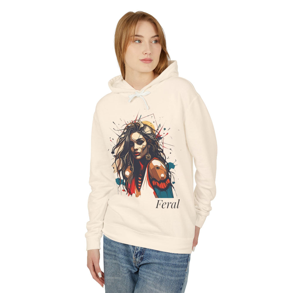 Woman in cream feral hoodie, colorful wild woman with wolf graphic and "Feral" text