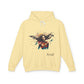 Yellow hoodie with a graphic design of a woman and the word 'Feral' on a white background