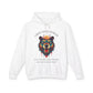 White hoodie with vibrant multicolored bear head graphic, roaring expression, mane in blue orange teal splashes, full moon above, "GROUNDED POWER" arched text, motivational quote "Even when life is overwhelming, your roots keep you steady" below