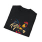 Black folded unisex cotton t-shirt featuring bold Year of the Rooster zodiac graphic print: vibrant abstract rooster portrait with detailed feathers, proud stance, intense eyes, red comb and wattles, geometric accents, and dynamic multicolored paint splatters in gold, red, black, blue, teal, and orange tones exploding outward. Chinese text "鸡年" (Year of the Rooster) printed below in white. Zodiac Chinese New Year motivational crewneck tee.