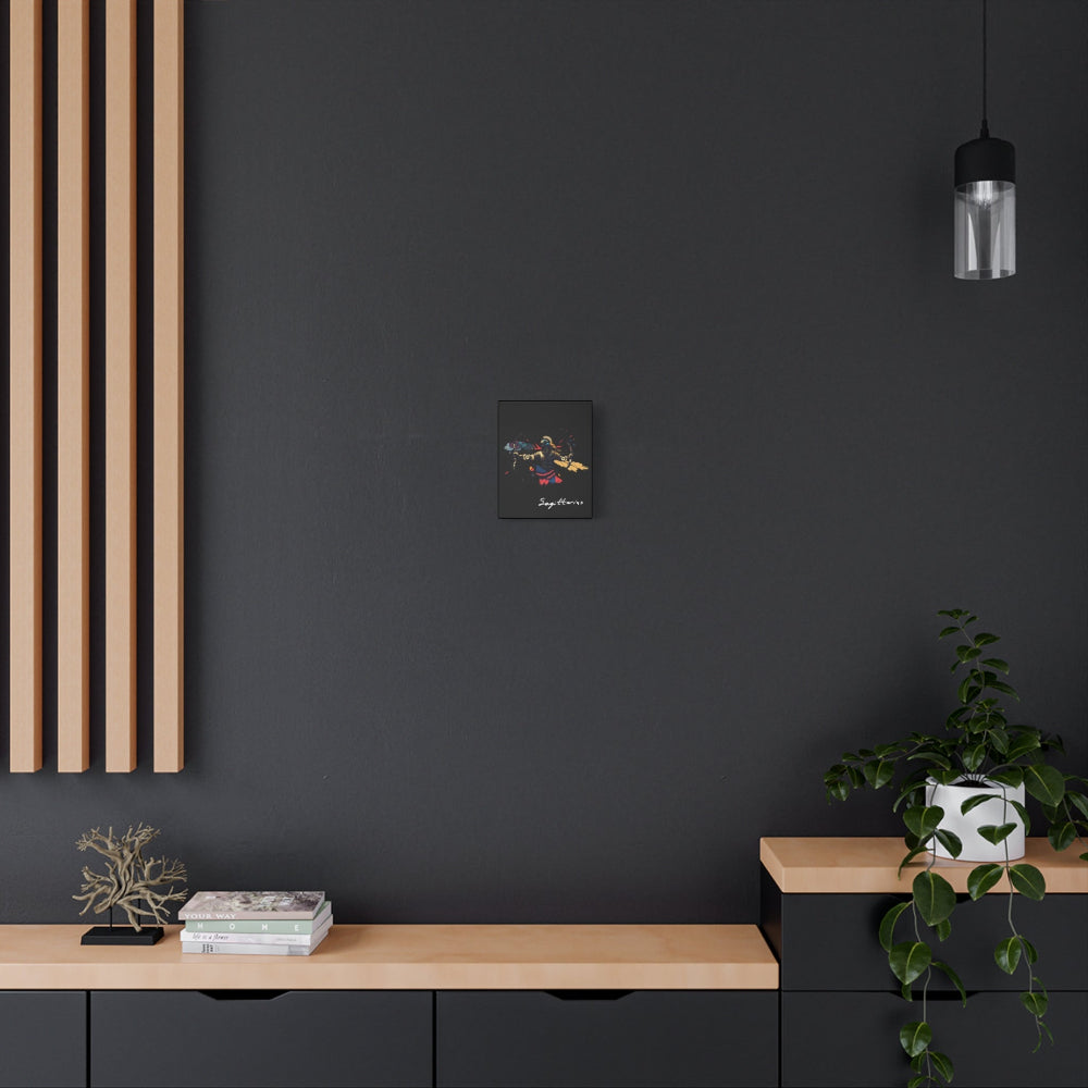 Black canvas wall art print of abstract Sagittarius archer with bow, dynamic pose, flowing cape, and colorful splatters on dark background, featuring "Sagittarius" in elegant white cursive  hung on a dark grey wall above a wooden shelf with potted plants.