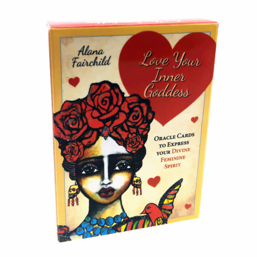 Love Your Inner Goddess Oracle Cards box by Alana Fairchild, featuring a vibrant illustration of a woman with red roses in her hair, a large red heart, and a colorful bird. Oracle deck for expressing your divine feminine spirit.