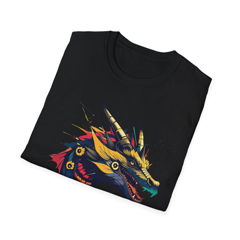 Black folded unisex cotton t-shirt featuring bold Year of the Dragon graphic print: vibrant abstract dragon head portrait with fierce open mouth, sharp horns, intricate scales, flowing mane, and dynamic multicolored paint splatters in gold, red, black, blue, teal, and orange tones exploding outward. Chinese text "龙年" (Year of the Dragon) printed below in white. Zodiac Chinese New Year motivational crewneck tee.