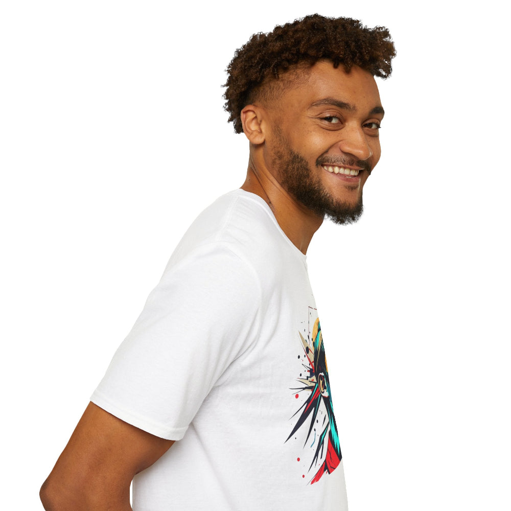 White unisex cotton t-shirt modeled by smiling man with curly hair and beard, featuring bold "Primal" graphic on chest: stylized intense man portrait with short curly hair, vibrant red, blue, yellow, and black paint splatters bursting outward. Primal masculine energy motivational crewneck tee.