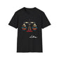 White unisex cotton t-shirt featuring bold Libra zodiac graphic: vibrant abstract scales of justice balanced on a central axis, intricate geometric patterns, symmetrical design with triangular and circular motifs, and dynamic multicolored paint splatters in gold, red, navy, teal, and black tones bursting outward. Elegant black cursive "Libra" text below. Astrology zodiac motivational crewneck tee.